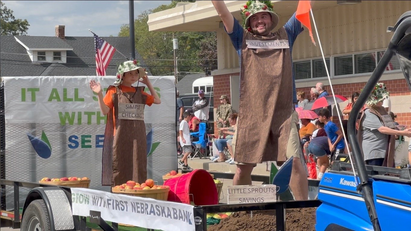 FNB's float, themed 'Grow with First Nebraska Bank...It all starts with a seed,' proudly took 3rd place at the 2024 AppleJack Festival!